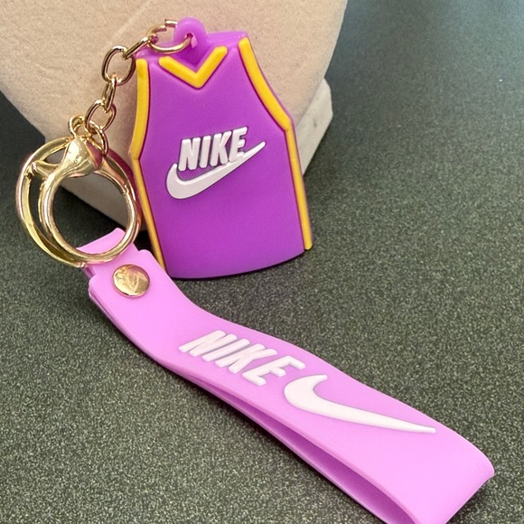 Nike Accessories - Nike Purple & Pink Silicone Jersey Keychain with Yellow Trim